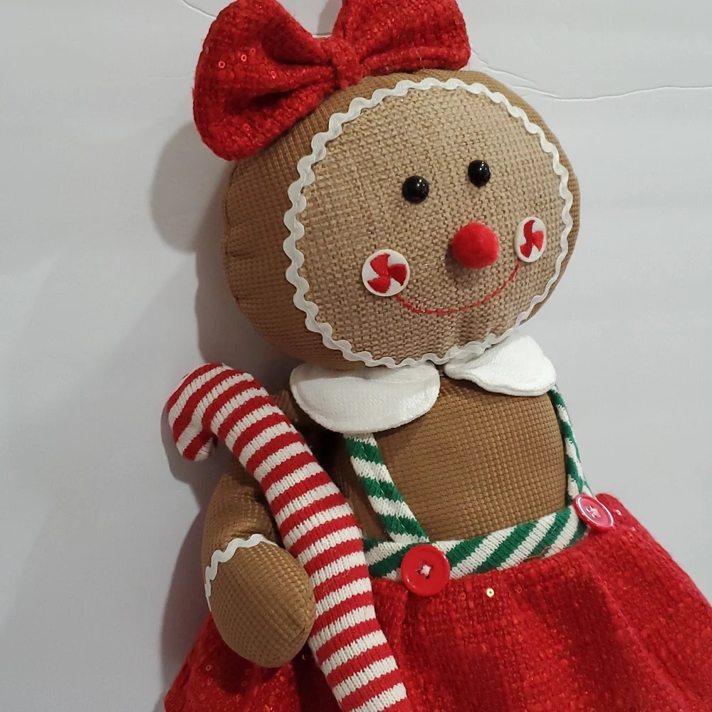 Gingerbread woman in red sequin boucle bow and‎ jumper Christmas holiday plushie